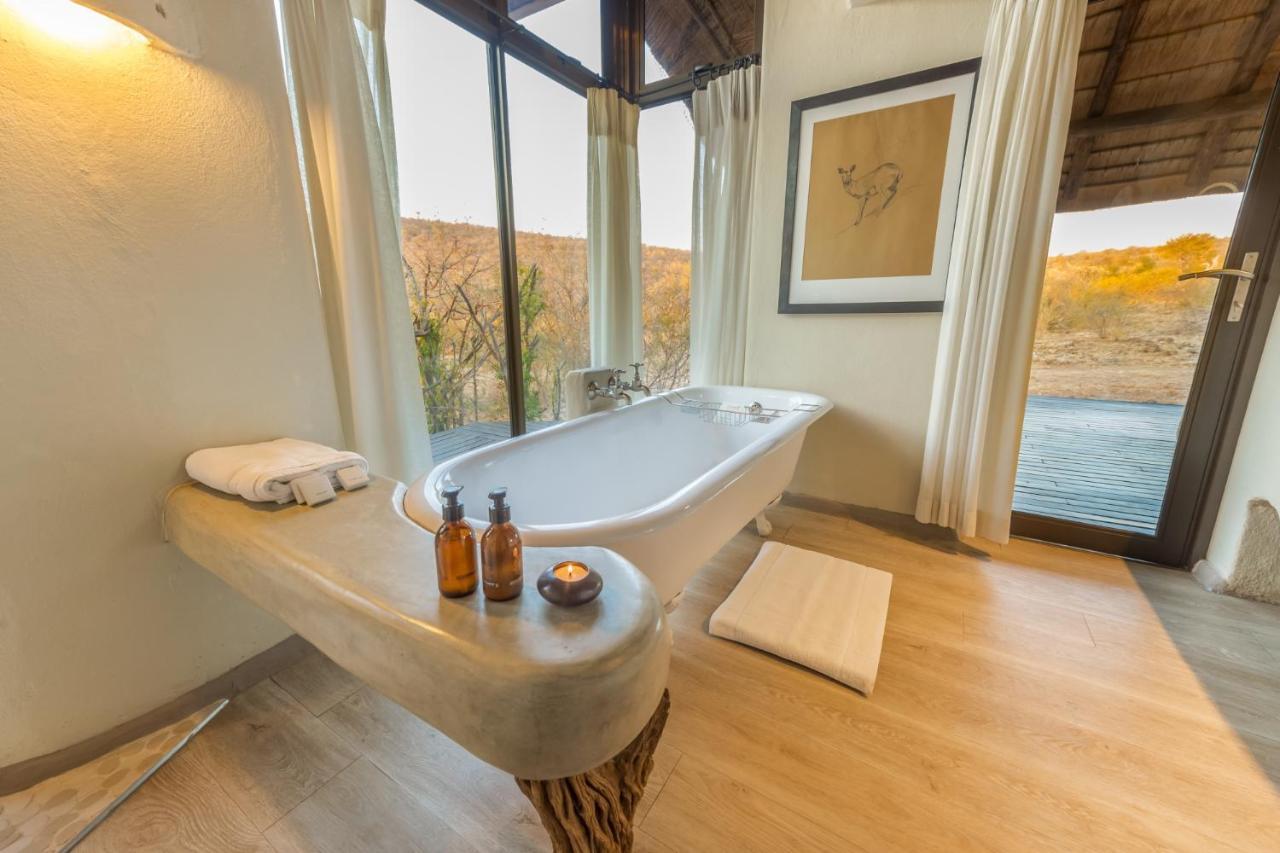 Impodimo Game Lodge Заповедник Мадикве Экстерьер фото