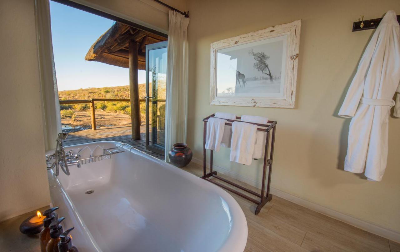 Impodimo Game Lodge Заповедник Мадикве Экстерьер фото